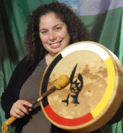 Melody Walker with hand drum.