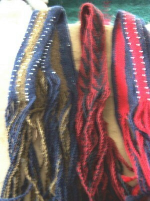 Fingerwoven leg ties made by Rose Hartwell.